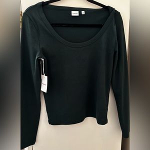 Sunday best dark green shirt with low neck. Women’s medium